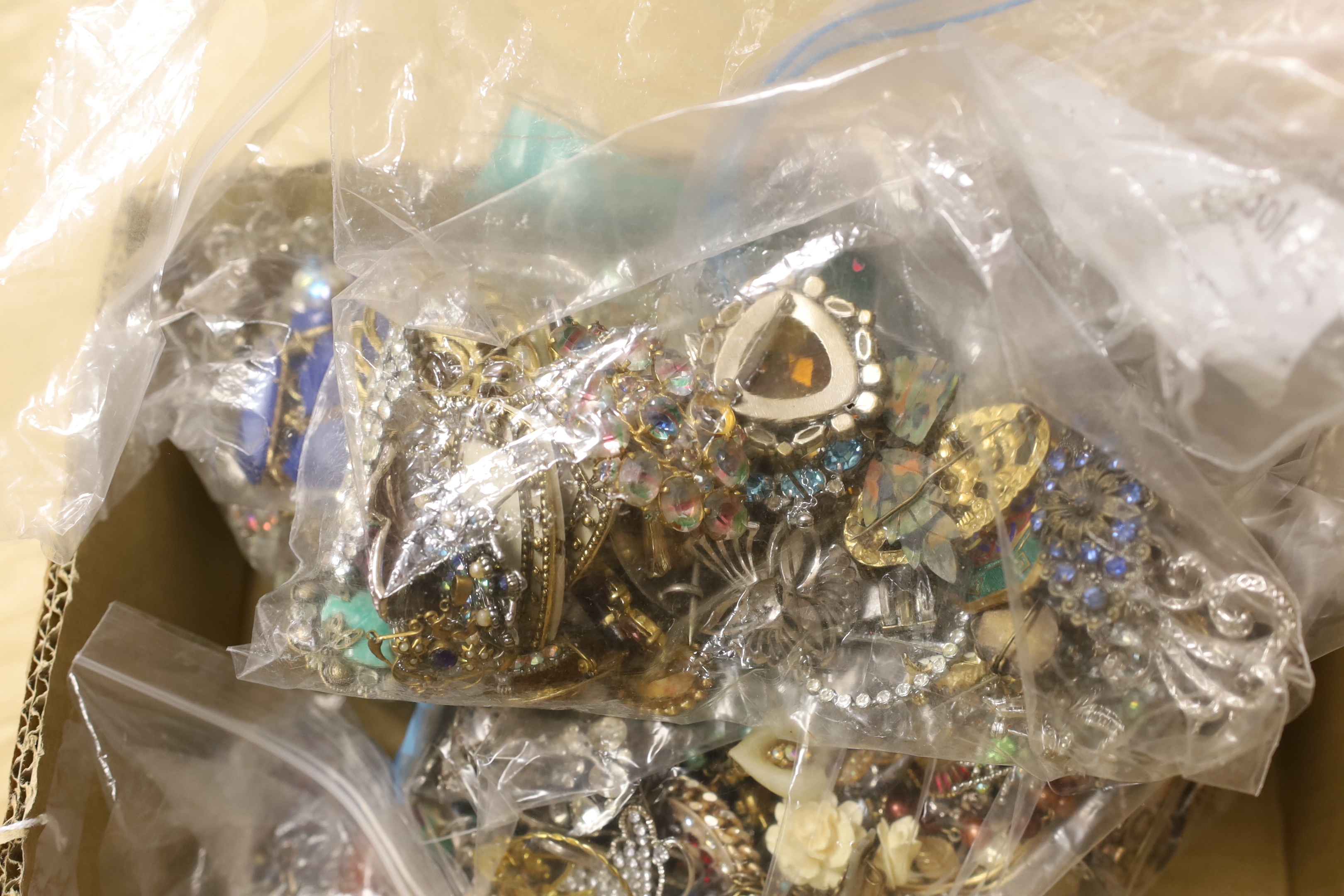 Ten bags of assorted costume jewellery, including necklaces, bracelets, brooches, etc.